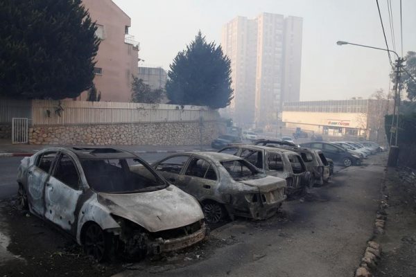 Cars burnt during a wildfire are seen in the northern city of Haifa, Israel November 24, 2016. REUTERS/Baz Ratner